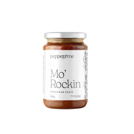 A 300g glass jar of Pepper and me Mo' Rockin Moroccan Paste with a white label and silver lid, set against a plain white background.