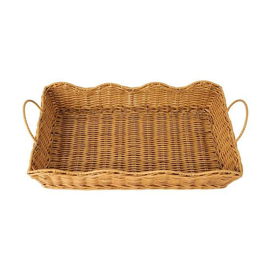 Wicker basket with handles on a white background